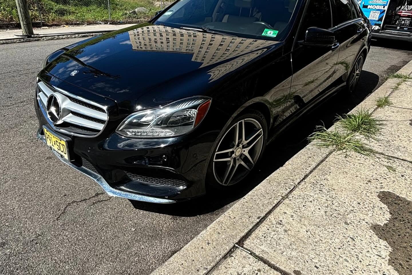 Professional detailer polishing a car at your location in Union County